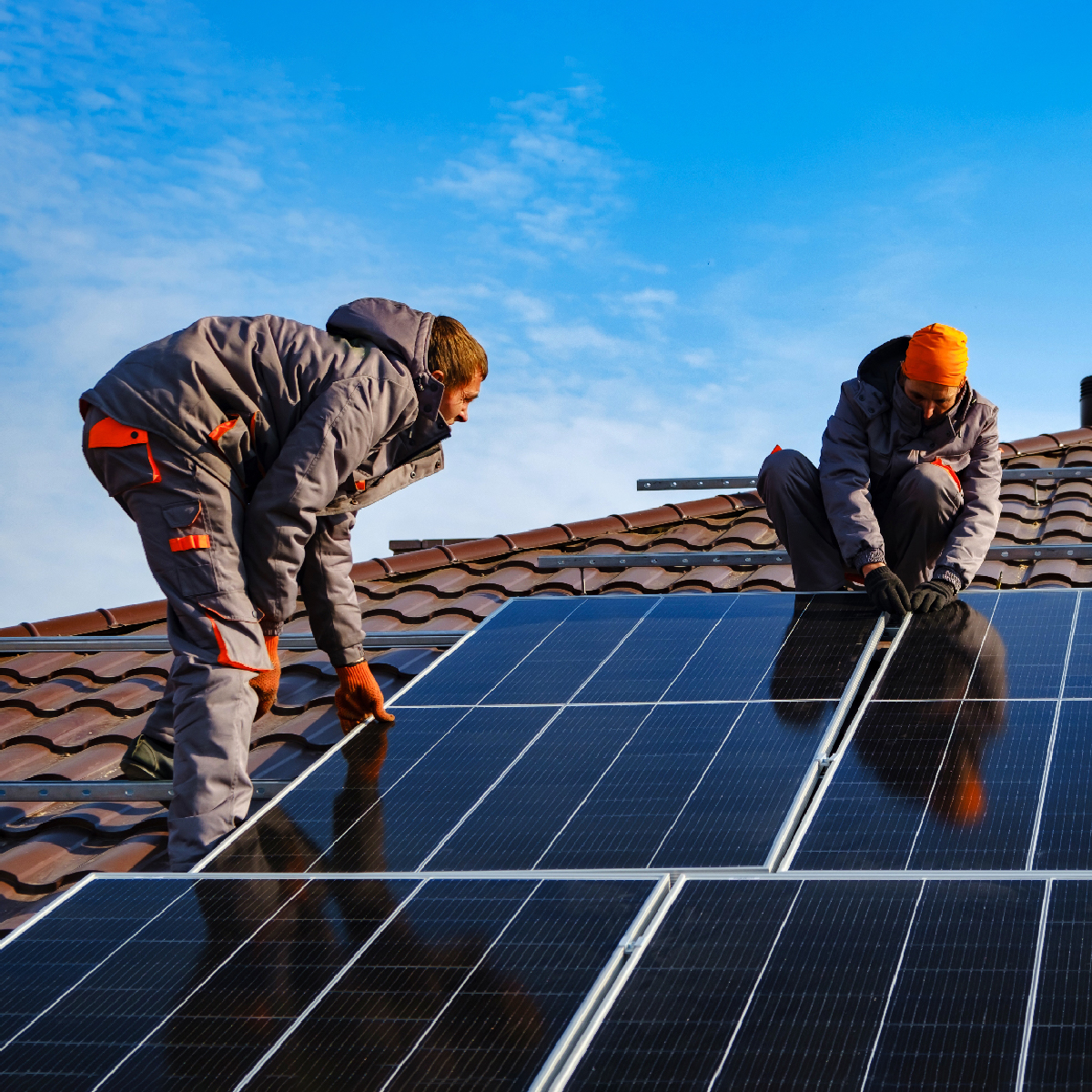 solar panel installers on roof 1200x1200px